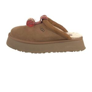 UGG Tan Shearling Lined Slip-Ons with Red Pom-Pom